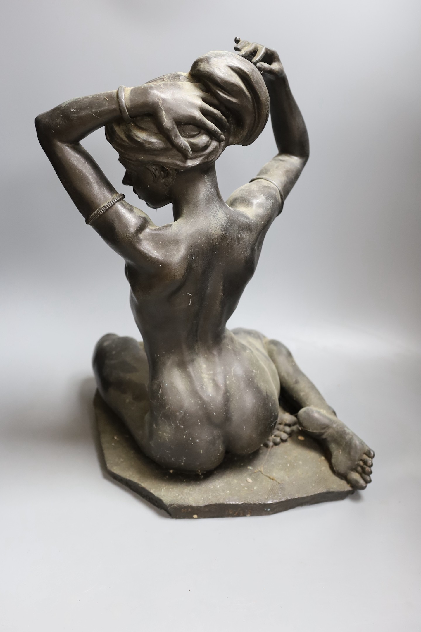 Ronald Cameron (b.1930). A large simulated bronze seated female nude - 36cm tall